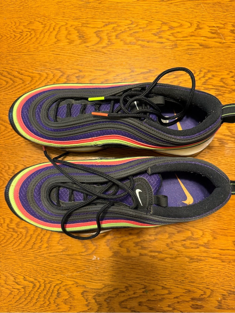 Nike Men’s Black Sneakers with Rainbow Stripe Accents